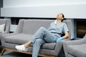 Nurse sleeping on couch